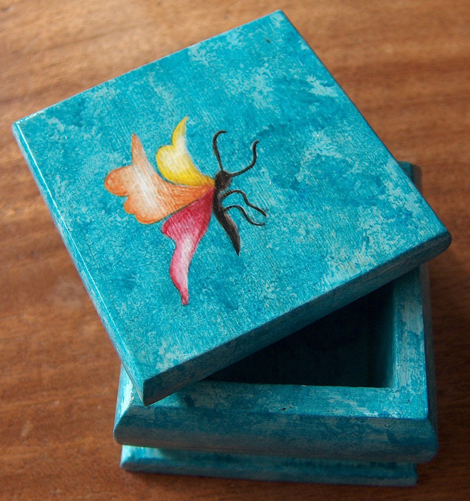 Taille 5 × 5 cm.